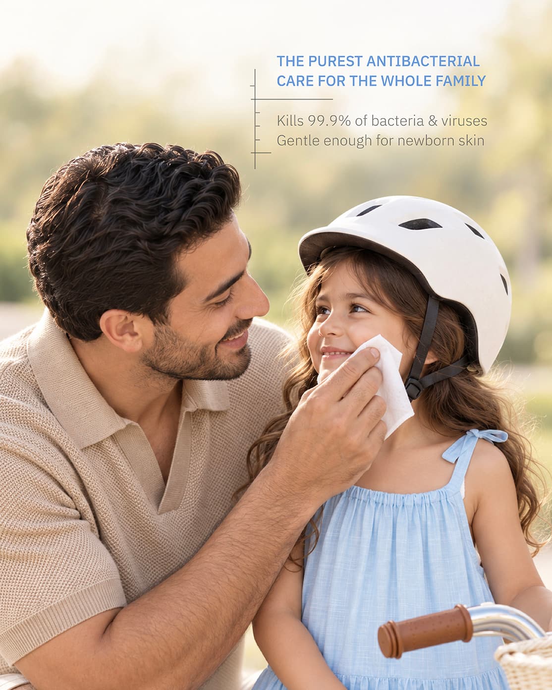 Father wiping his daughter's face with a Pure Reset Antibacterial Wipe